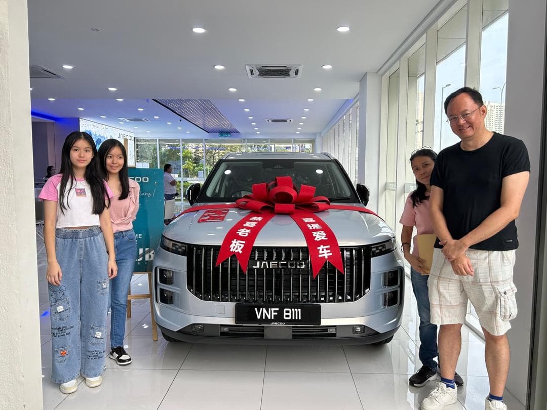 Customer collecting a Jaecoo J8 at Apple Autotech Sdn. Bhd., Bukit Jalil